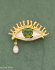 Whimsical 18K Gold Eye Brooch with Peridot, Diamonds & Pearl Teardrop