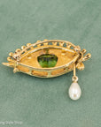 Whimsical 18K Gold Eye Brooch with Peridot, Diamonds & Pearl Teardrop