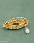 Whimsical 18K Gold Eye Brooch with Peridot, Diamonds & Pearl Teardrop