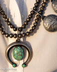 Vintage Navajo Sterling Silver Bead Necklace with Naja Pendant and 10 Coin Charms