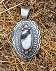 Chimney Butte White Buffalo Pendant, Scalloped Oval Concho, Navajo Sterling