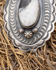 Chimney Butte White Buffalo Pendant, Scalloped Oval Concho, Navajo Sterling