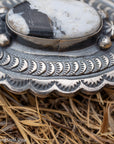 Chimney Butte White Buffalo Pendant, Scalloped Oval Concho, Navajo Sterling