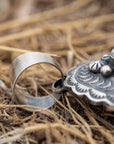 Chimney Butte White Buffalo Pendant, Scalloped Oval Concho, Navajo Sterling