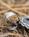Chimney Butte White Buffalo Pendant, Scalloped Oval Concho, Navajo Sterling