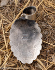 Chimney Butte White Buffalo Pendant, Scalloped Oval Concho, Navajo Sterling